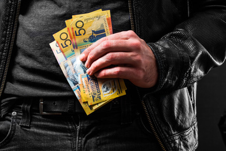 Australian bank notes in handの写真素材