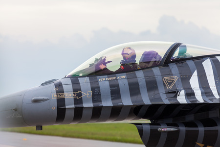 BERLIN / GERMANY - MAY 2014: turkish F-16 air force " soloturk " on the ILA ( Internationale Luft- und Raumfahrtausstellung) Berlin Air Show in berlin at may 2014. The center shows the pilot.のeditorial素材