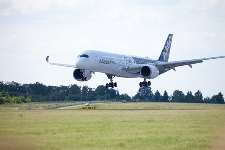 BERLIN / GERMANY - JUNE 3,2016: Airbus A 350 - 900 plane lands on airport in Berlin / Germany on June 3, 2016.のeditorial素材