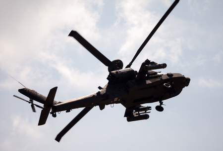 BERLIN / GERMANY - JUNE 3, 2016: Boing AH-64 Apache flights on airport schoenefeld, berlin / germany at june 3, 2016のeditorial素材