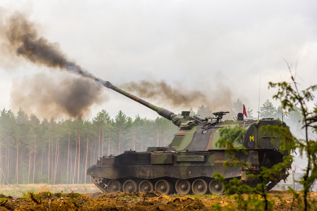 german self-propelled howitzer shoots on battlefieldのeditorial素材