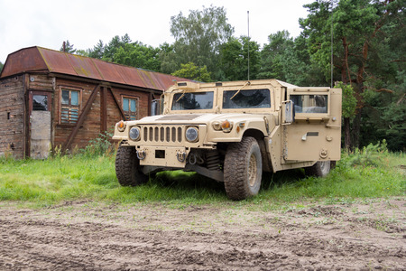 military vehicle stands on green terrainのeditorial素材