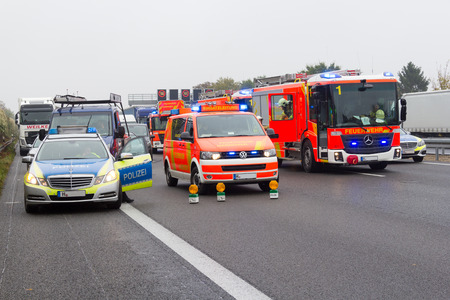HANNOVER / GERMANY - OCTOBER 25, 2016: german emergency service cars stands on freeway a2  by a truck crash near Hannover.のeditorial素材