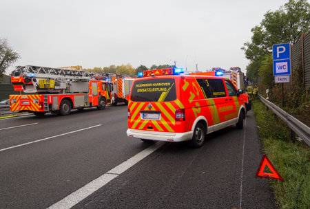 HANNOVER / GERMANY - OCTOBER 25, 2016: german firefighting trucks stands on freeway a2  by a truck...