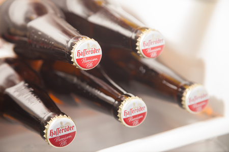 BURG / GERMANY - November 13, 2016: German HasserÃÂ¶der premium pils beer lies in a fridge. HasserÃÂ¶der is a brewery in Wernigerode, Saxony-Anhalt, Germany, owned by Anheuser-Busch InBev.のeditorial素材