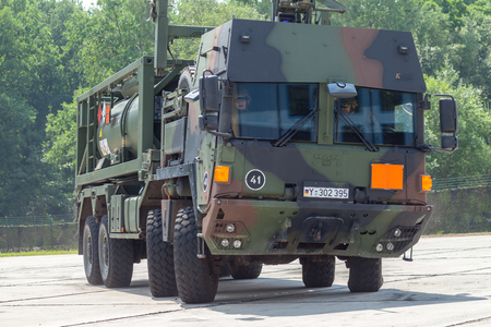 BURG / GERMANY - JUNE 25, 2016: german military MAN Multi 2 swap body truck tanker at open day in barrack burgのeditorial素材