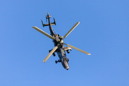 BERLIN / GERMANY - APRIL 28, 2018: Military twin-engined attack helicopter Tiger, from Airbus Helicopters flies at airport Berlin / Schoenefeld.のeditorial素材