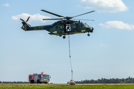 BERLIN / GERMANY - JUNE 28, 2018:  german military transport helicopter, NH 90 flies on airfield in Berlin, Germany.のeditorial素材