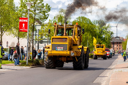 ALTENTREPTOW MECKLENBURG- WEST POMERANIA - MAY 1, 2018: Russian Kirowez K 700 tractor drives on street at an oldtimer showのeditorial素材
