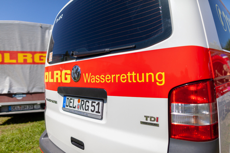 Delmenhorst / Germany - MAY 6, 2018: German VW Volkswagen Transporter from DLRG Wasserrettung stands on a meadow. DLRG Wasserrettung means German Lifeguard Associationのeditorial素材