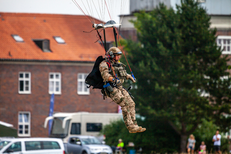 FELDKIRCHEN / GERMANY - JUNE 9, 2018: Paratrooper from Bundeswehr, german army lands on an open day on day of the Bundeswehr in Feldkirchenのeditorial素材