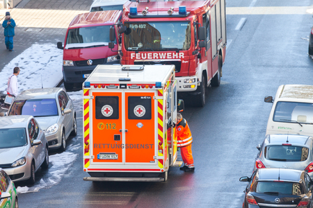 FUERTH / GERMANY - MARCH 4, 2018: German emergency service vehicles stands on street near an accident in a houseのeditorial素材