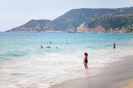 ANTALYA / TURKEY - SEPTEMBER 30, 2018: People enjoys a sunny day on Antalya beachのeditorial素材