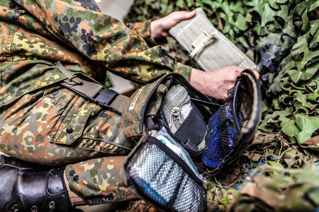 Military first aid bag on a german soldierの写真素材