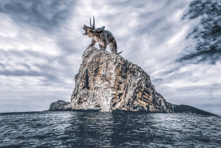 Prehistoric Triceratops stands on a rock in a beautiful landscapeの写真素材