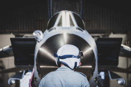 A mechanic stands in front of a german military aircraftの写真素材