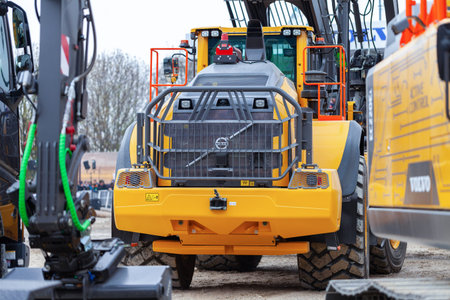 MUNICH / GERMANY - APRIL 14, 2019: Volvo excavator works on a construction site in Munich.