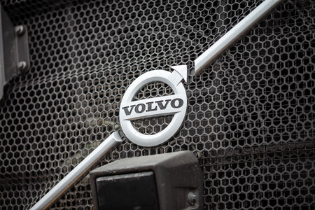 MUNICH / GERMANY - APRIL 14, 2019: Volvo emblem on a Volvo digger at construction site.のeditorial素材