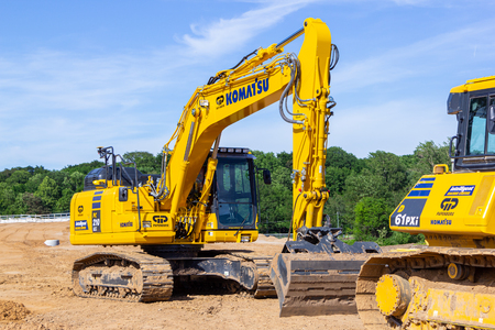 HANOVER / GERMANY - JUNE 2,2019: Komatsu excavator stands on a construction site in Hanover.のeditorial素材