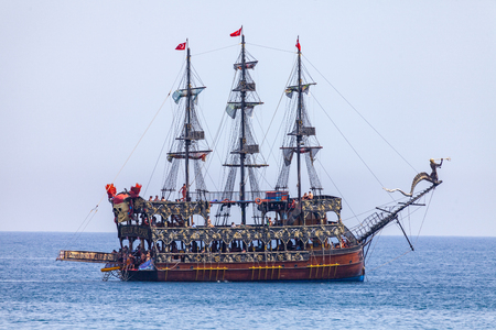 ALANYA / TURKEY - JUNE 3, 2019: Pirate party ship sails on the coast of Alanya, Turkey.のeditorial素材