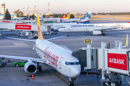 ANTALYA / TURKEY - JUNE 6, 2019: Boing 737 from Pegasus Airlines stands on gate 113 at airport Antalya, Turkey.のeditorial素材