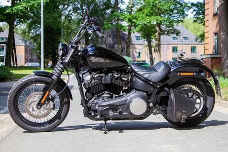 WUNSTORF / GERMANY - JUNE 7,2019: Harley Davidson motorcycle stands on a street. Harley Davidson  is an American motorcycle manufacturer founded in 1903 in Milwaukee, Wisconsin.のeditorial素材