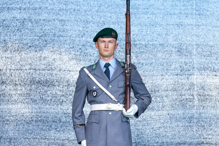 AUGUSTDORF / GERMANY - JUNE 15, 2019: German soldier from the guard battalion walks on a stage at...