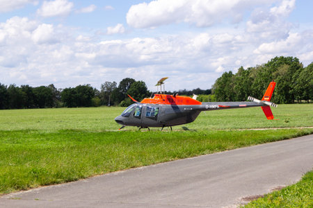 BUECKEBURG / GERMANY - JUNE 13, 2019: Bell 206B JetRanger III flies for military training missions over a helicopter landing zone in Bueckeburg.のeditorial素材