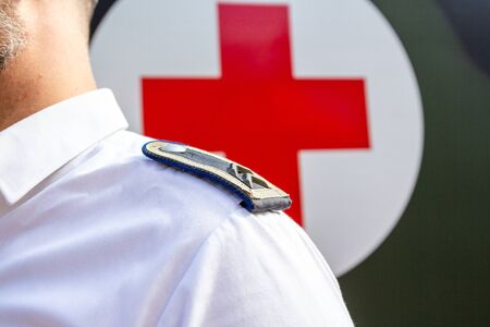PEINE / GERMANY - JUNE 22, 2019: German paramedic soldier stands at public event, day of uniform in Peine.のeditorial素材