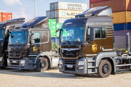 NUREMBERG / GERMANY - AUGUST 4, 2019: Different trucks from the American multinational package delivery, United Parcel Service (UPS), stands near container terminal in Nuremberg.のeditorial素材