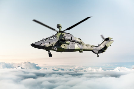German military armed attack helicopter in flight