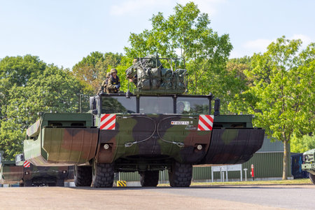 MINDEN / GERMANY - SEPTEMBER 4, 2019: Panzerpionierbattaillon trained a tank crossing over a river...