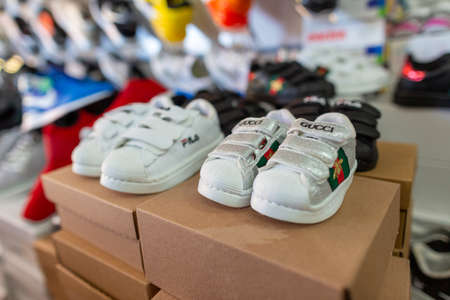 ANTALYA / TURKEY - January 19, 2020: Shoes of various brands stands in a shoe market shopのeditorial素材