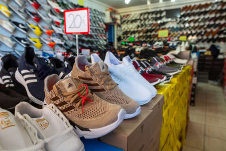 ANTALYA / TURKEY - January 19, 2020: Shoes of various brands stands in a shoe market shopのeditorial素材