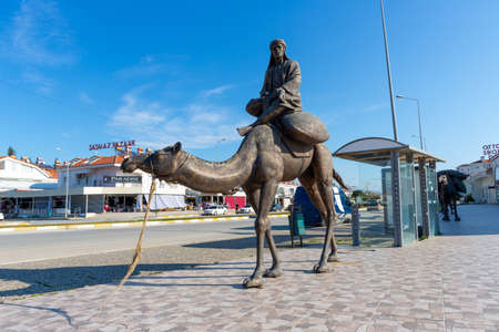 Side, Turkey - January 18, 2020: Camel statue in front of a market at Side, Turkey.のeditorial素材
