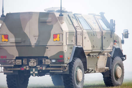 Feldkirchen, Germany - June 9, 2018: German ATF Dingo, from Bundeswehr, drives on a road at Day of the Bundeswehr. The ATF Dingo is a German heavily armored military MRAP infantry mobility vehicle.のeditorial素材