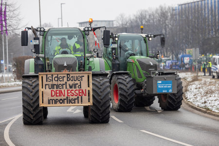 Hannover, Lower Saxony, Germany - January 11, 2024: Farmer protests in Lower Saxony at a large demonstration in Hanover. There are demonstrations against the dismantling of agricultural subsidies.のeditorial素材
