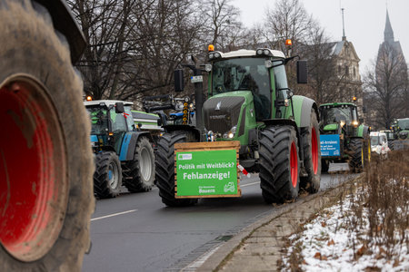 Hannover, Lower Saxony, Germany - January 11, 2024: Farmer protests in Lower Saxony at a large demonstration in Hanover. There are demonstrations against the dismantling of agricultural subsidies.のeditorial素材