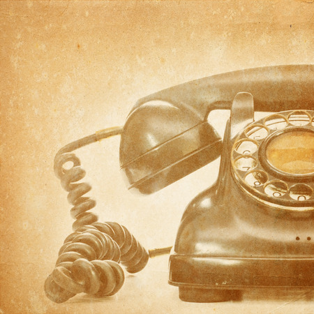 Old telephone on grunge background の写真素材