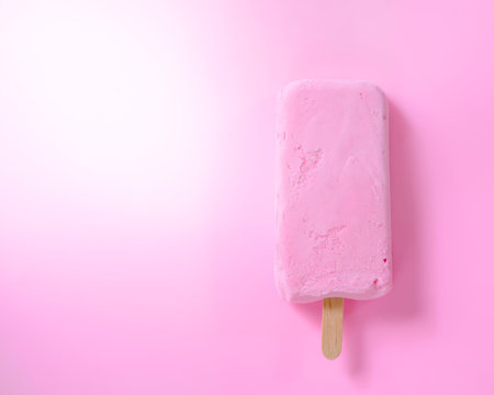 Ice cream stick on pink background., Pastel tone.