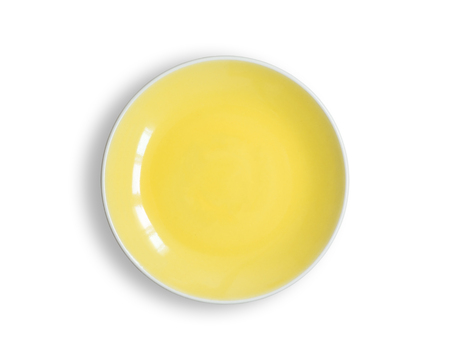 Blank white dish isolated on a white background.の写真素材
