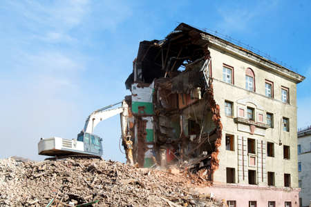 excavator loader machine at demolition construction siteの写真素材