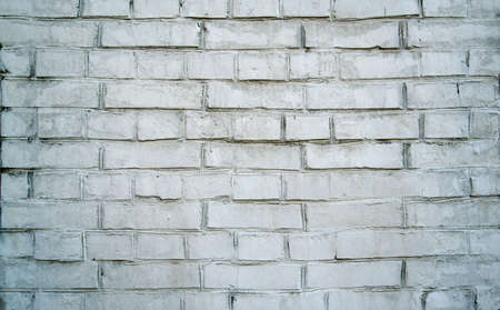 White grunge brick wall background. Cracked White Brick Wall. White Stone Wall.の写真素材