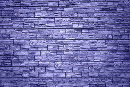 Background of blue bricks. Wall of blue bricks. The texture of the wall. Texture of blue decorative tiles in form of brickの写真素材