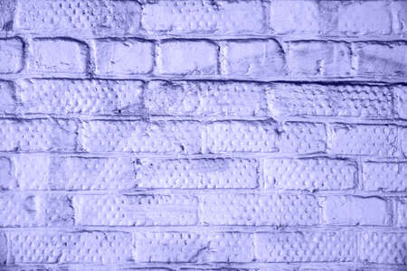 Brick wall painted with paint surface for background. Brick wall. Close-up. Old wallの写真素材