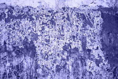 Old wall grunge background with delicate abstract texture and dirty paint. Blue paint with brush and cement wall texture background. The texture of plaster, concrete, stucco.の写真素材
