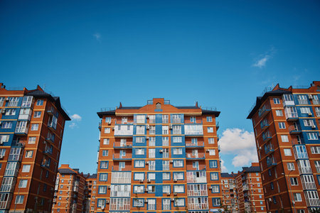 Multi storey building. New modern residential building is ready for living. color house.