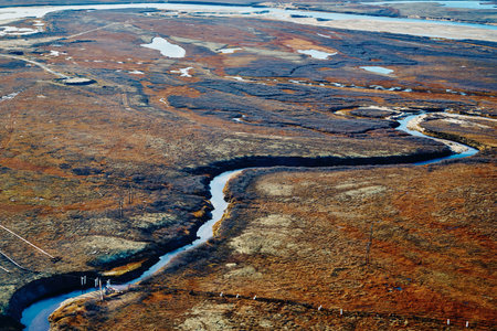 Summer nature landscape from above. mountain range aerial view. river bank in the morning in the tundra. Taimyr Peninsula, Russia. Norilsk.の写真素材