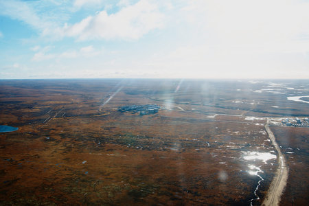 Extraction of natural gas. Mining. Industrial village in the tundra. view from above.