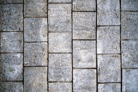 Black and white brick wall background. Detail of a Black and white brick wall texture.